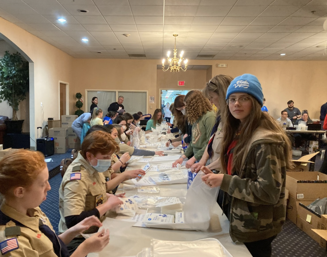 Plast Scouts around the U.S. pack Pocket First Aid Kits for the Scouts for Ukraine initiative